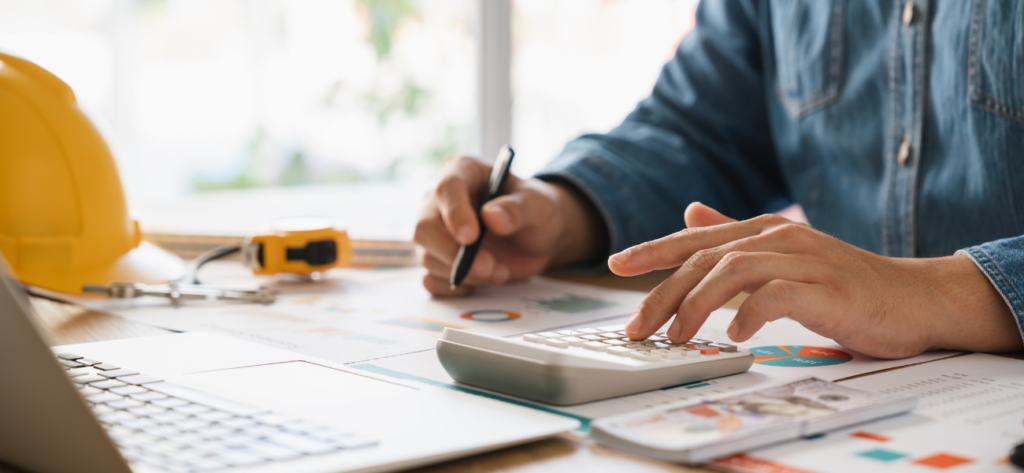 Man at Construction Company working on Financial Management