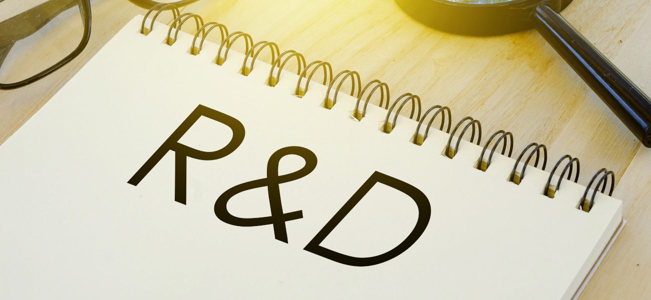 Business,And,Finance,Conceptual.,Sunglasses,pen,magnifying,Glass,And,Notebook,Written,With